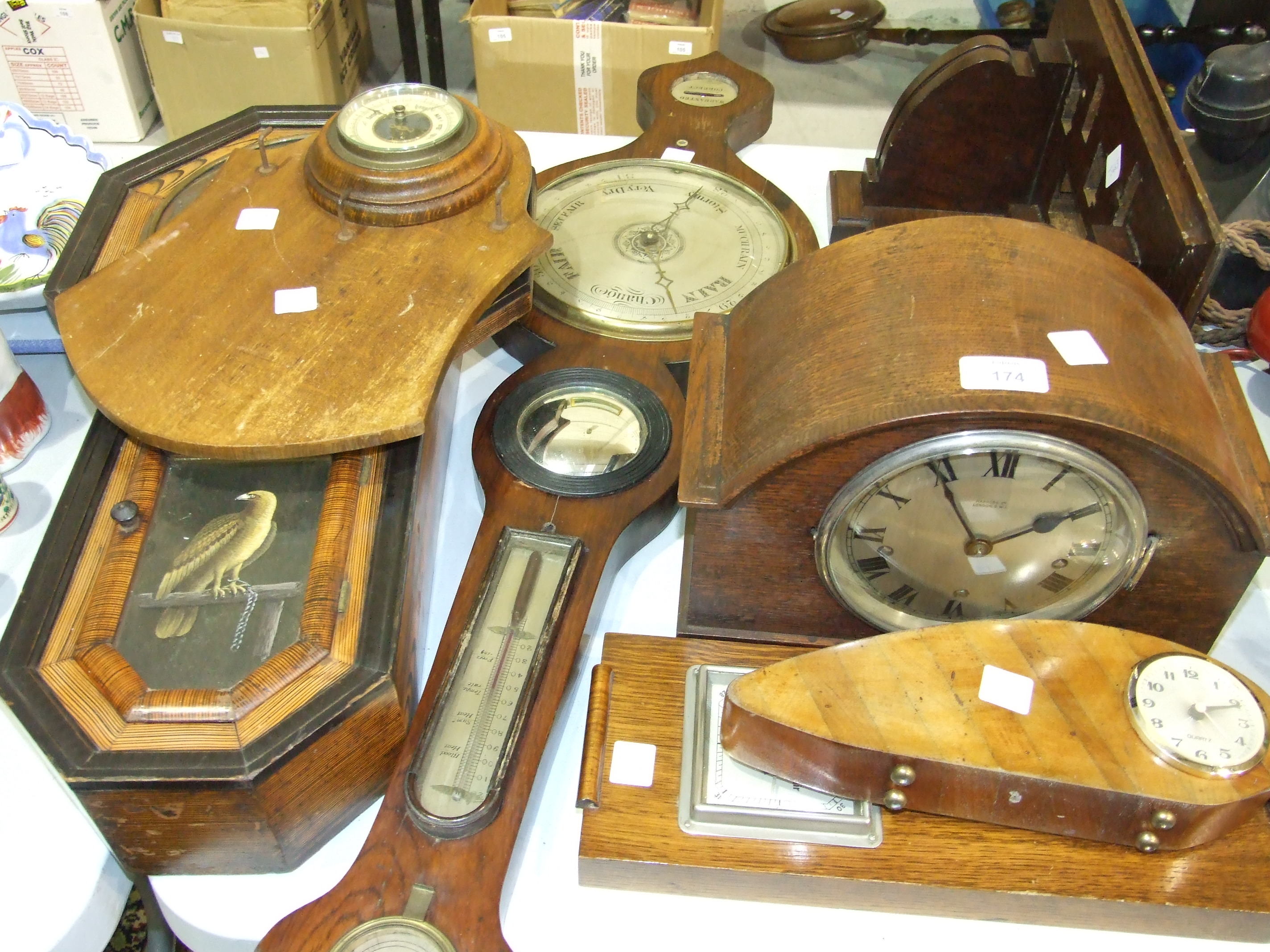 An oak clock bracket, an American wall clock case, the door painted with an eagle, an oak mantel