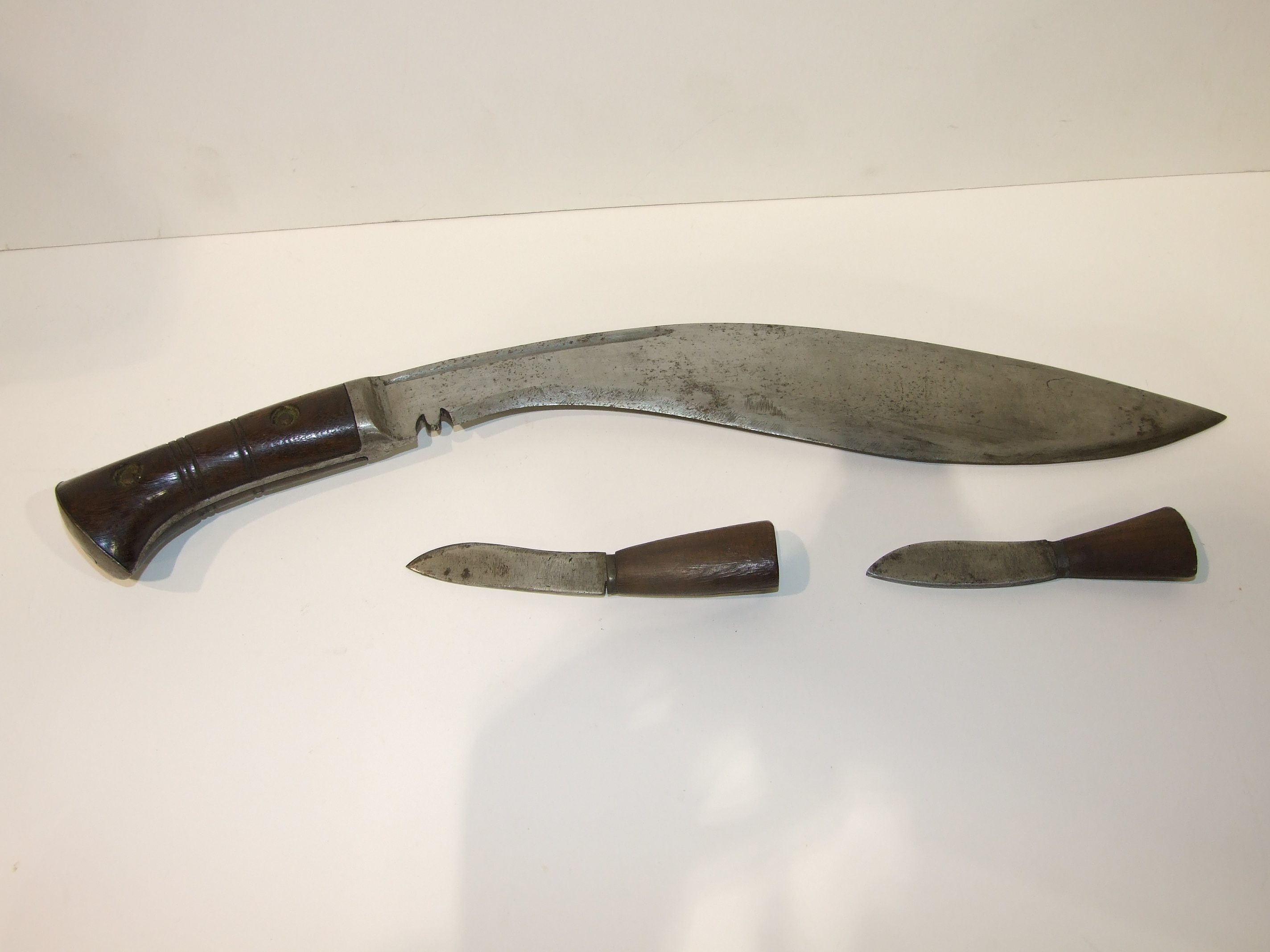 A wood-handled kukri knife with leather-bound canvas scabbard, two bayonets and other items. - Image 3 of 4