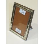 A silver rectangular photograph frame, Birmingham 1913, 17 x 12.5cm.