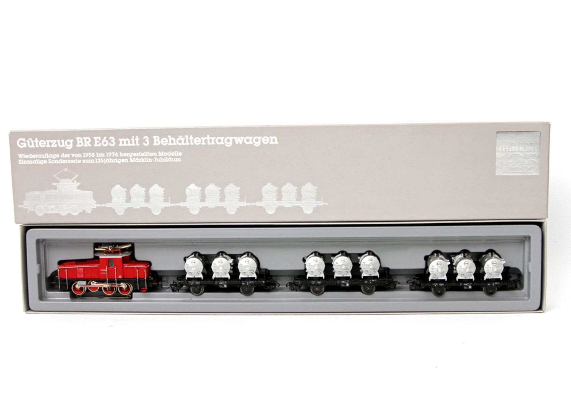 MÄRKLIN 2874, Spur H0, Güterzug mit Lok BR E63 und drei Behältertragwagen Typ BTS 50 mit der