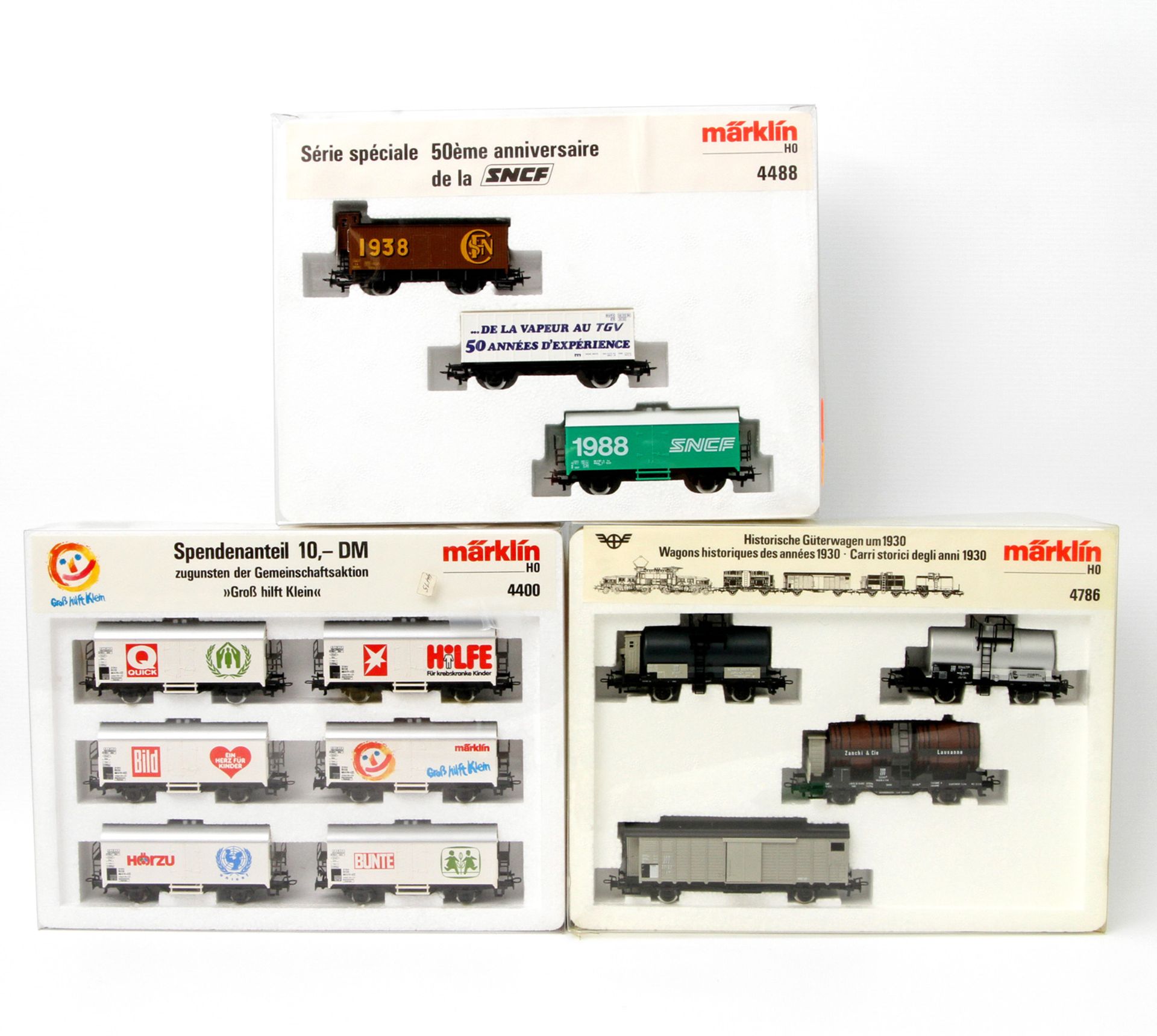 MÄRKLIN drei Wagen-Sets 4488, 4786 und 4400, Spur H0, 4488: "50 Jahre SNCF", 3 Güterwagen; 4786: 4