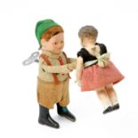 SCHUCO Tanzfigur mit Kind, gemarkt (Kind und Figur), Funktion: Figur dreht sich im Kreis und