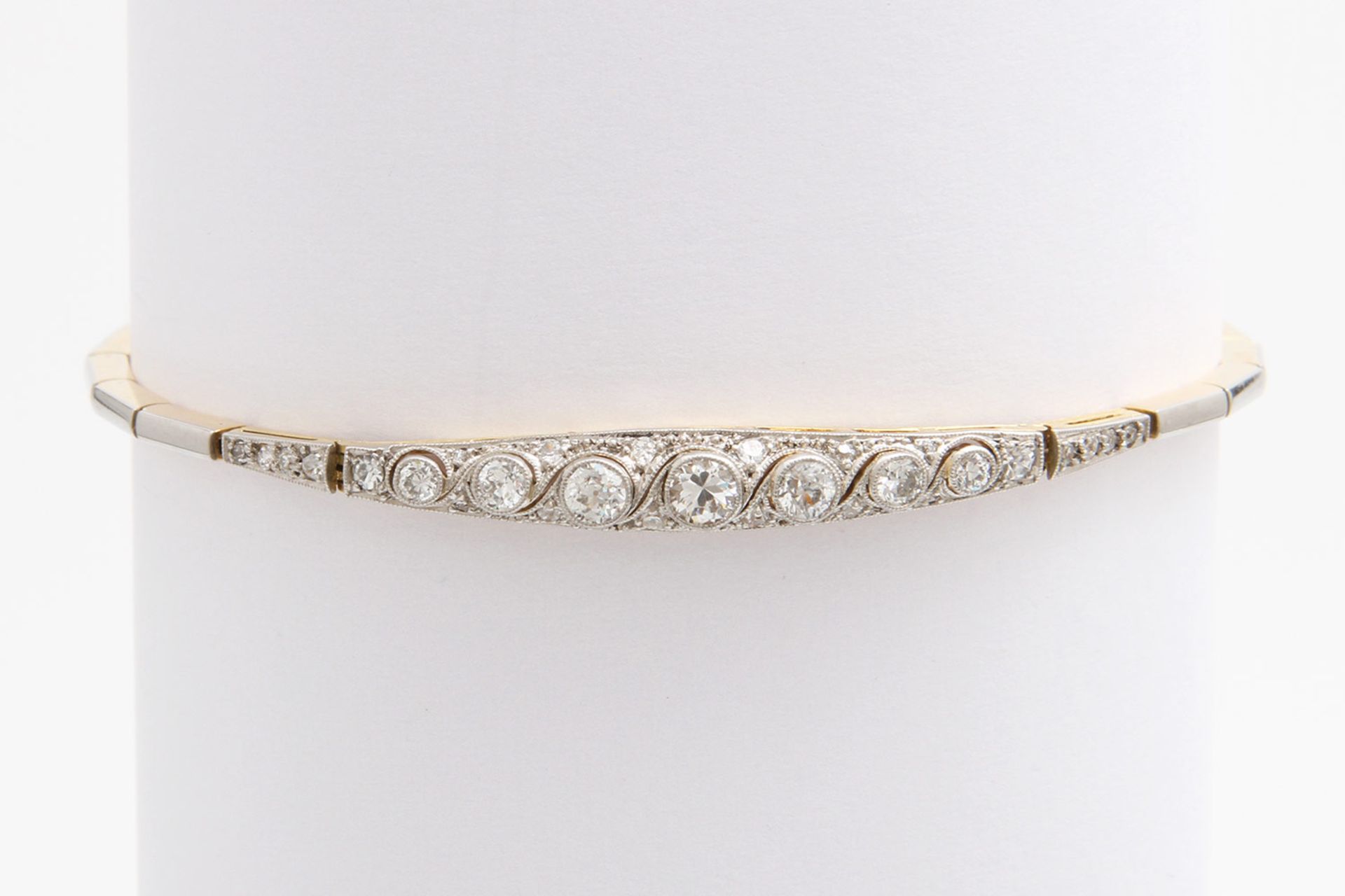 ART DECO Armband besetzt m. Altschliff-Diam. zus. ca. 0,6ct. GG 14K, Schauseite platiniert. L: ca.