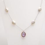 Collier besetzt m. einem ovalfac. Amethyst (ca. 15 x 11,5mm). WG 14K. L: ca. 45cm. Leichte