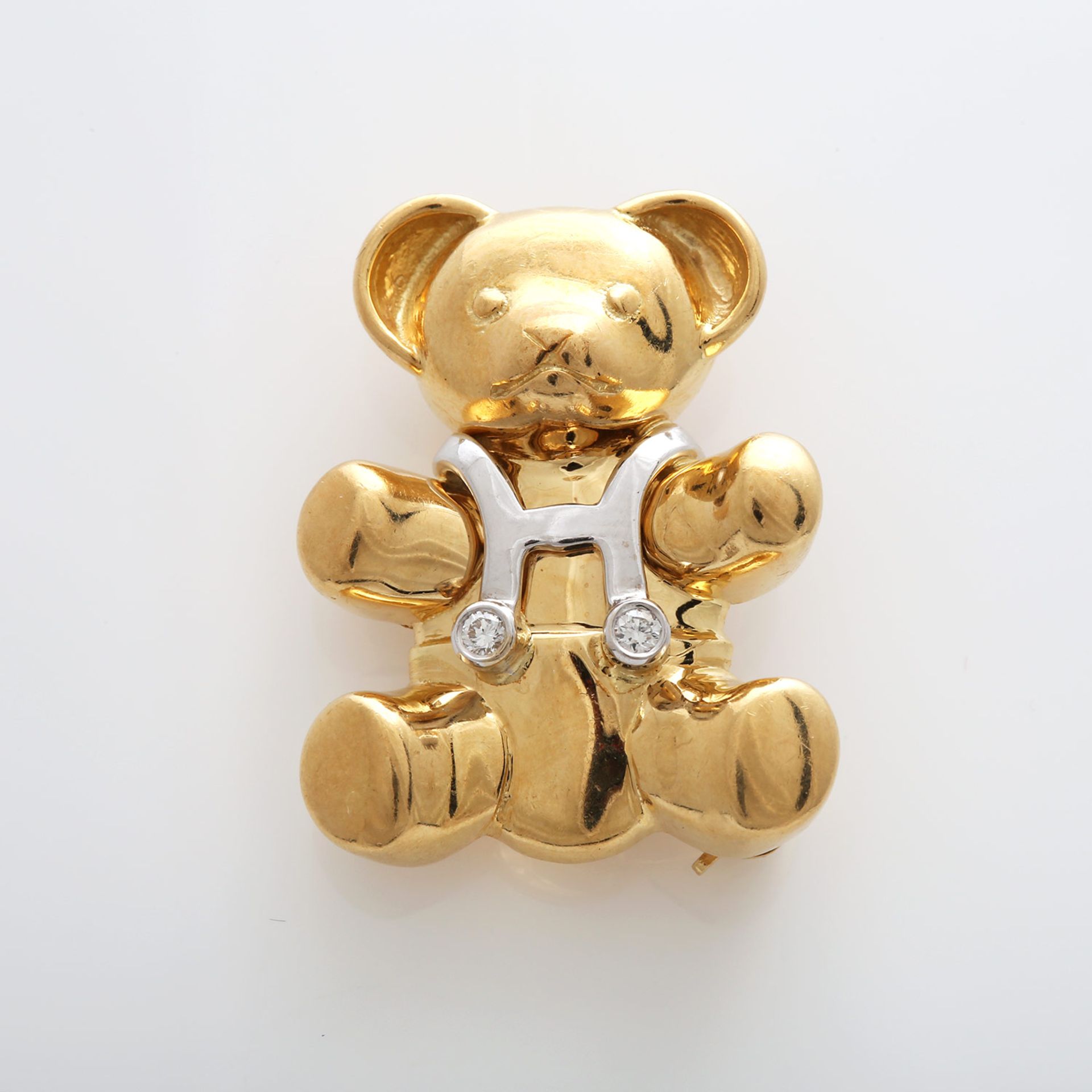 WEMPE Anhänger / Brosche "Teddy Bär" besetzt m. 2 Diam.-Brillanten zus. ca. 0,06ct FEINES WEIß /