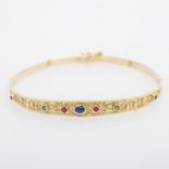 Zierliches Armband ausgefasst mit Farbsteinen in GG 14K. WbW: ca. 580.-. L: ca. 18cm. * Leg. 585/