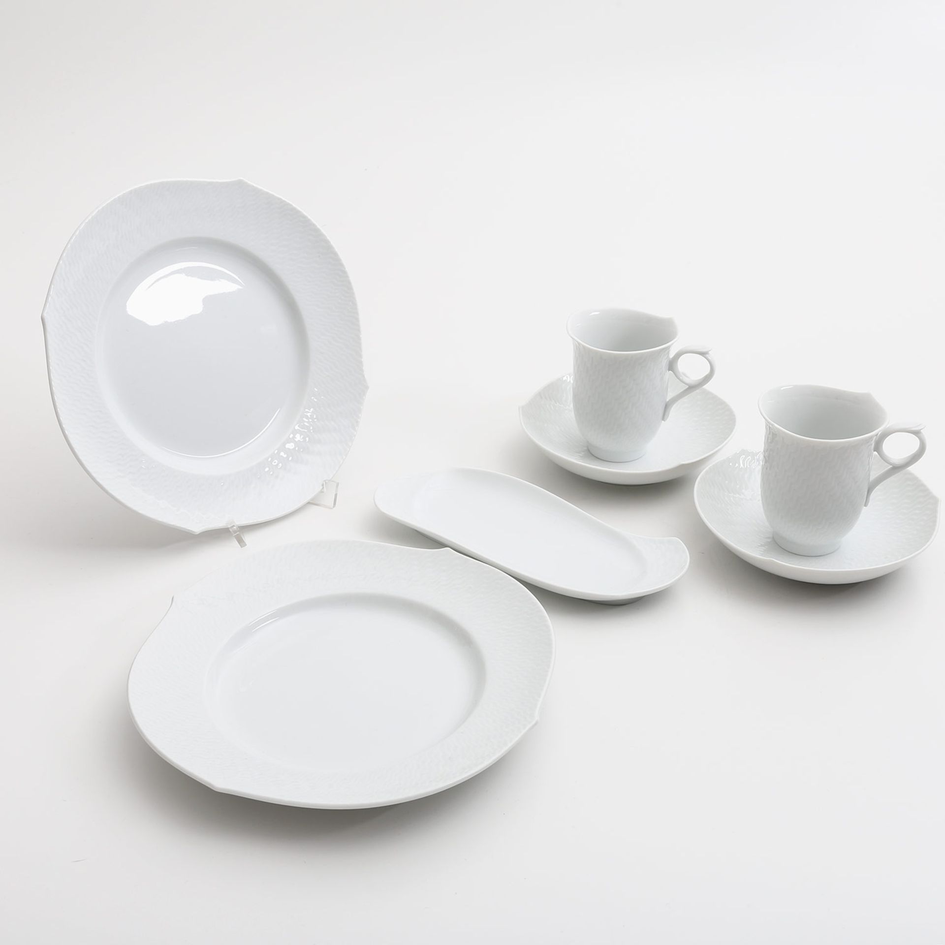 MEISSEN Paar Kaffeegedecke 'Wellenspiel Relief', 20./21. Jhd. Weißporzellan, 2 KaffeetassenU-Tassen,