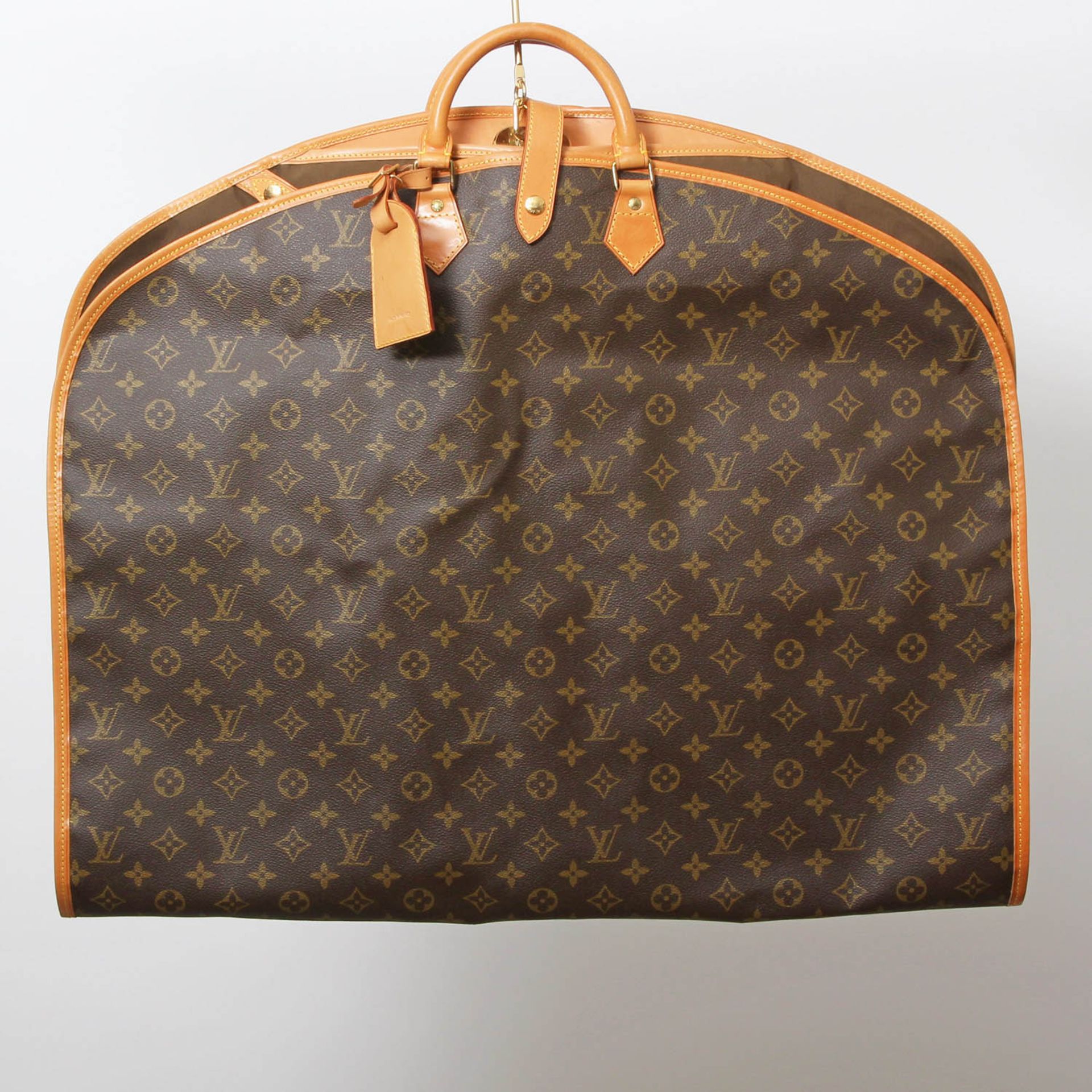 LOUIS VUITTON VINTAGE praktische Kleiderhülle, Koll. 1990. Akt. NP.: 1.480,-. Monogram Canvas