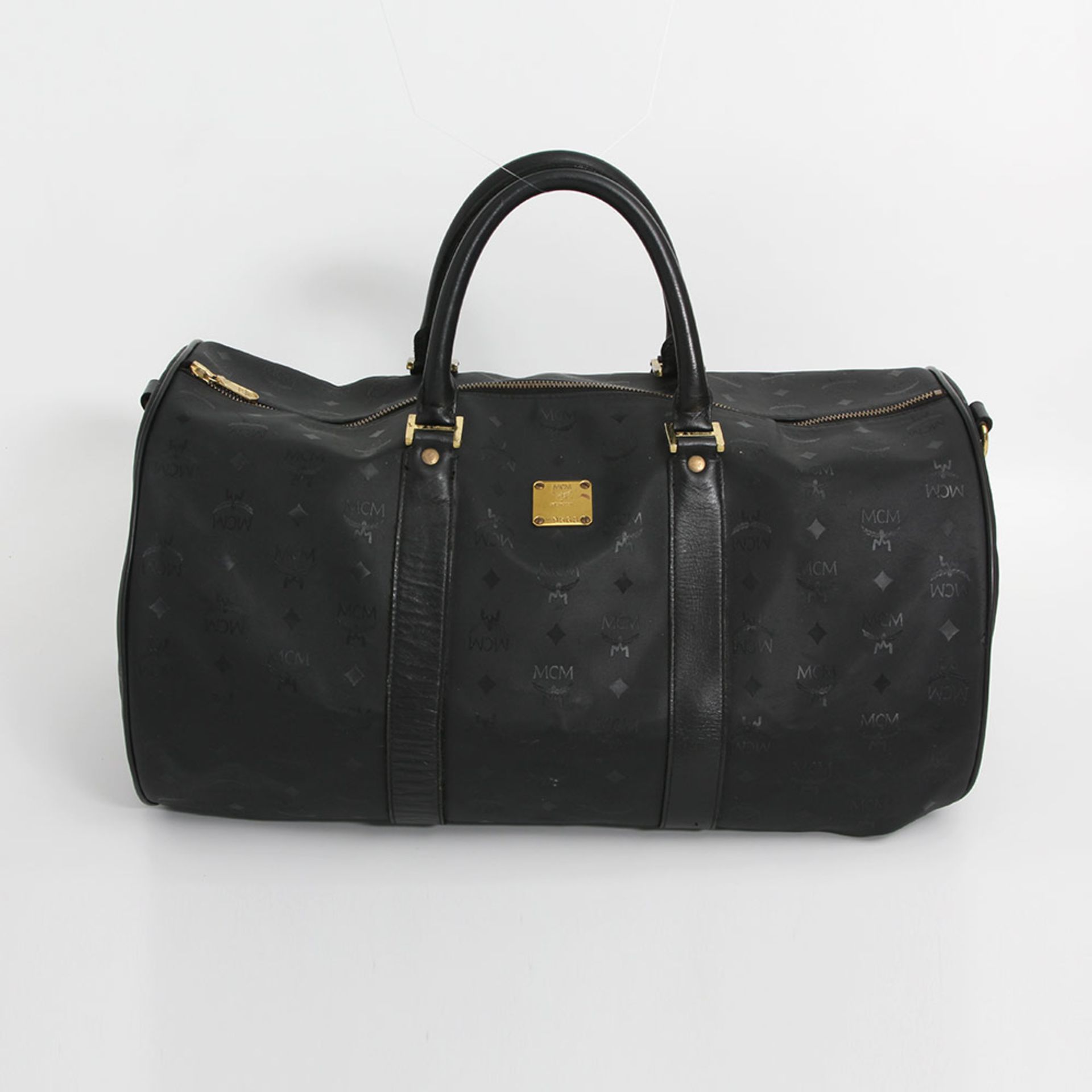 MCM VINTAGE begehrter Weekender. Zeitlose Form aus schwarzem Snthetik mit Heritage Struktur und