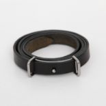 HERMÈS edles Wickelarmband, Länge 74cm. Schwarzes Swift Leder, silberfarbene Schließe mit