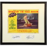 Singin' In The Rain (1952) US Lobby card, mounted with signatures of Gene Kelly & Cyd Charisse,