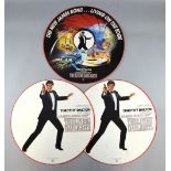 James Bond The Living Daylights (1987) Three circular hanging card displays, 17 inches diameter (3)