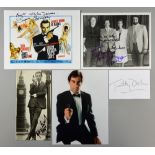 James Bond - Five signed items by different 007's including; Sean Connery, Roger Moore, George