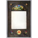 C H Powell, Watford School of Art, an Arts and Crafts wall mirror inset with enamel plaques, an