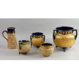 Doulton stoneware, three tygs of various sizes, largest 21 x 23 cm, a small jardinière and a jug, (