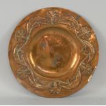 Arts and Crafts copper dish with foliate scrolling border 30cm dia