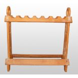 Light oak stick stand with the pierced end supports with Gothic revival decoration, 76 x 72 x 28