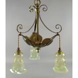 Art Nouveau, brass three light chandelier, hammered finish, vaseline glass shades with fleur-de-