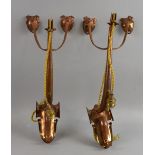 A pair of copper wall lights in Arts and Crafts style, later production, stamped marks for retailer