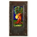 C H Powell an enamel plaque depicting an angel under a tree, in copper frame with hammered finish