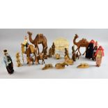 Carved olive wood nativity set, other related figures and mother of pearl carving of last supper,