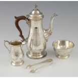 American Sterling silver three piece coffee service, comprising coffee pot, cream jug and sugar bowl