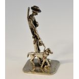 Italian silver figure of a man and dog, marked 'Italy 800', 0.4oz, 12g,