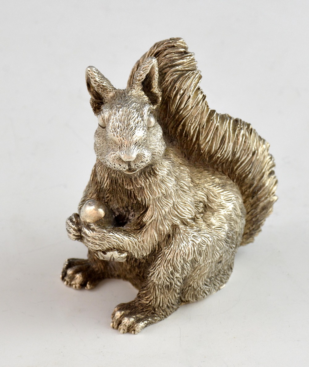 Continental silver model of a squirrel holding an acorn, marked 'Magrino', import marks for