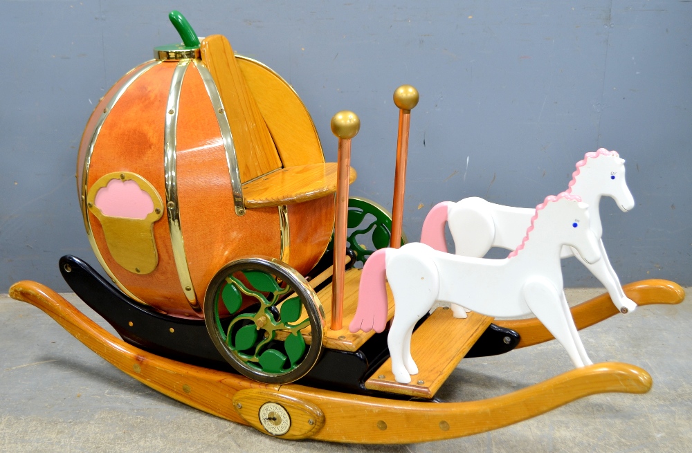 20th century child's rocking carriage in the from of pumpkin pulled by two horses, purchased Fortnum