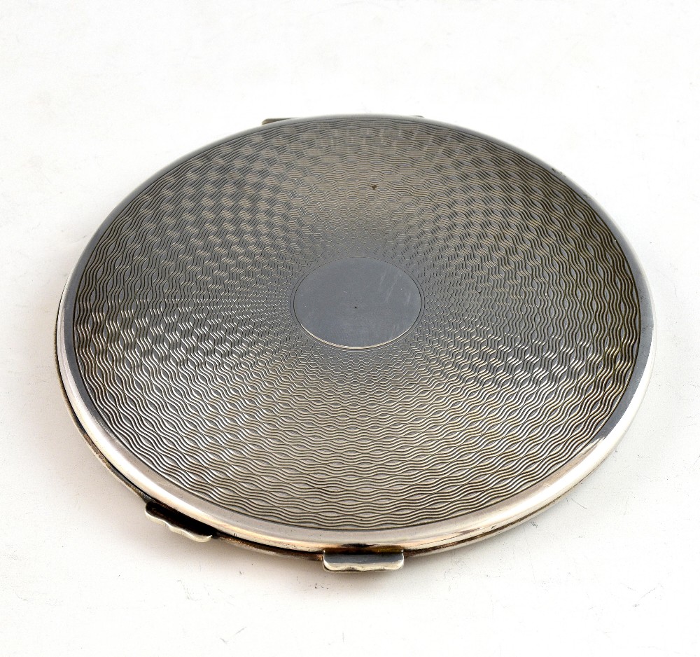 George VI silver compact with engine turned decoration, by R Davis & Co., Birmingham, 1945, 9cm