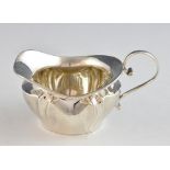 Edward VII silver cream jug of serpentine form, by Frederick Wilson & Co., Sheffield, 1906, 2.4oz,