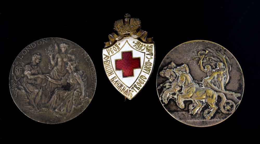 1908 commemorative Olympic medal, Franco British Exhibition medal, and an enamelled badge,