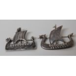 2 GEORGE MALCOLM SMITH SHETLAND ISLES SILVER BROOCHES IN THE FORM OF VIKING SHIPS.