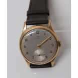 OMEGA GENTS 9CT GOLD WRISTWATCH WITH SUBSIDIARY SECONDS & BROWN LEATHER STRAP (IN WORKING ORDER).