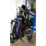 2 SETS OF GOLF CLUBS & TROLLIES