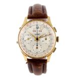 EBERHARD & CO. - a gentleman's triple date chronograph wrist watch. Yellow metal case, stamped 18K