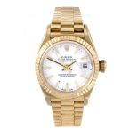 ROLEX - a lady's Oyster Perpetual Datejust bracelet watch. Circa 1997. 18ct yellow gold case with