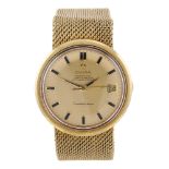 OMEGA - a gentleman's Constellation bracelet watch. 18ct yellow gold case, hallmarked Birmingham