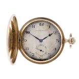 A full hunter pocket watch by Tavannes Watch Co. Yellow metal case, stamped 0.585. Numbered