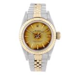 ROLEX - a lady's Oyster Perpetual bracelet watch. Circa 1990. Stainless steel case with yellow metal