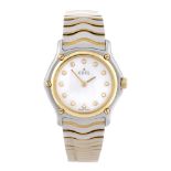 EBEL - a lady's Classic Wave bracelet watch. Stainless steel case with yellow metal bezel. Reference