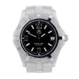 TAG HEUER - a gentleman's 2000 Exclusive bracelet watch. Stainless steel case with calibrated bezel.