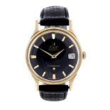 OMEGA - a gentleman's Constellation wrist watch. Yellow metal case, stamped 14K 0,585. Numbered