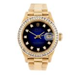 ROLEX - a lady's Oyster Perpetual Datejust bracelet watch. Circa 1984. 18ct yellow gold case with