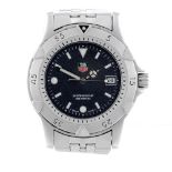 TAG HEUER - a mid-size 1500 Series bracelet watch. Stainless steel case with calibrated bezel.