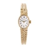 TISSOT - a lady's bracelet watch. 9ct yellow gold case, import hallmarked London. Numbered 78300.