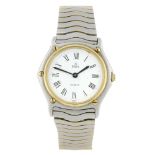 EBEL - a mid-size Classic Wave bracelet watch. Stainless steel case with yellow metal bezel.