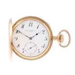 A full hunter pocket watch by Patek Philippe. Yellow metal case with engraved cuvette, stamped 0,