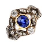 A mid 19th century gold sapphire and diamond ring. The oval-shape sapphire collet, with old-cut