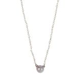 A cultured pearl necklace. The cultured pearl, measuring approximately 7.3mms, suspended from seed
